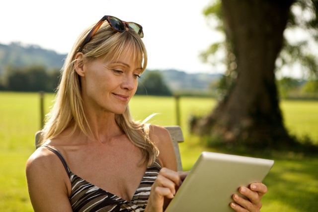 Woman Tablet Outside