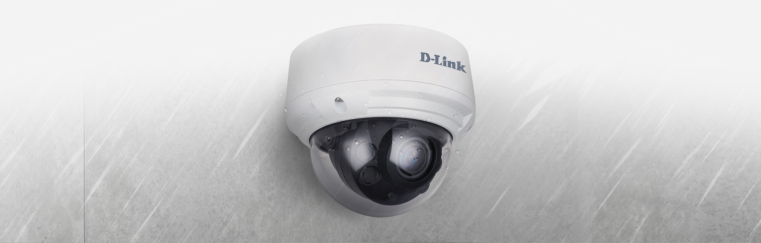 DCS-4614EK Vigilance 4 Megapixel H.265 Outdoor Dome Camera mounted outdoors in the rain.