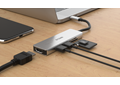DUB-M530 5-in-1 USB-C Hub with HDMI and SD/microSD Card Reader - on a desk connected to a laptop and showing example connections