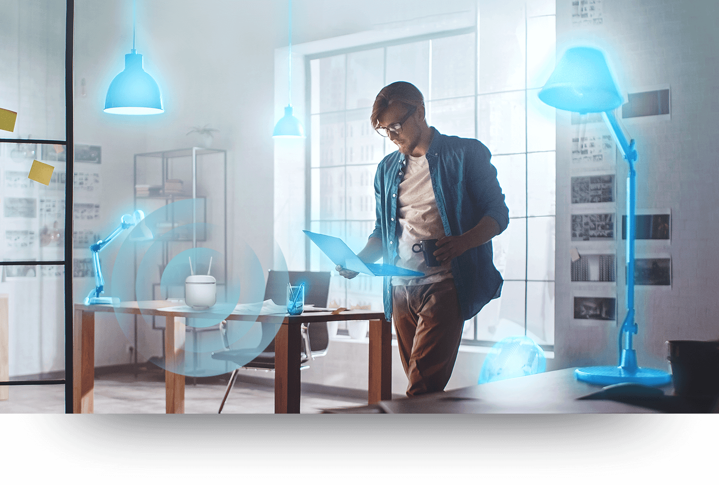 Man surrounded by smart home devices.