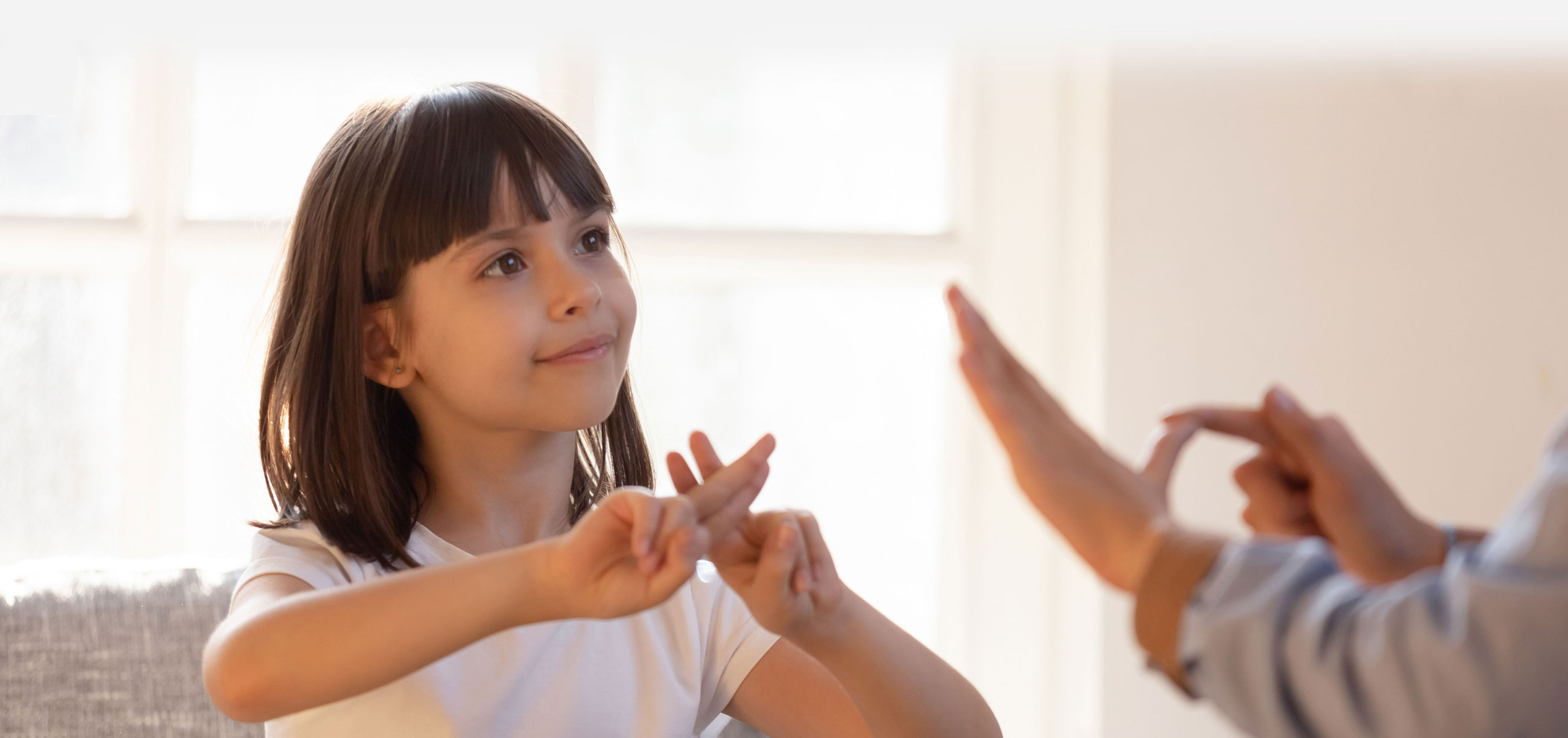 Girl using sign language